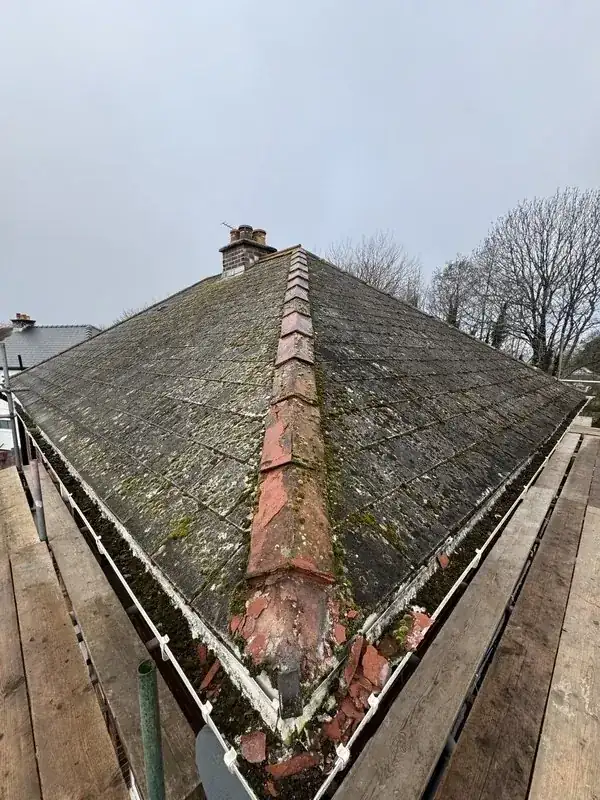 Pitched tiled roof before replacement