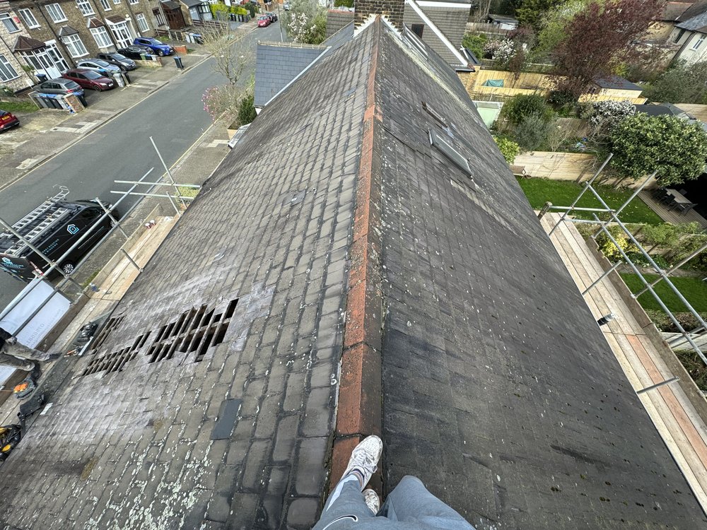 Before slate roof replacement Surrey